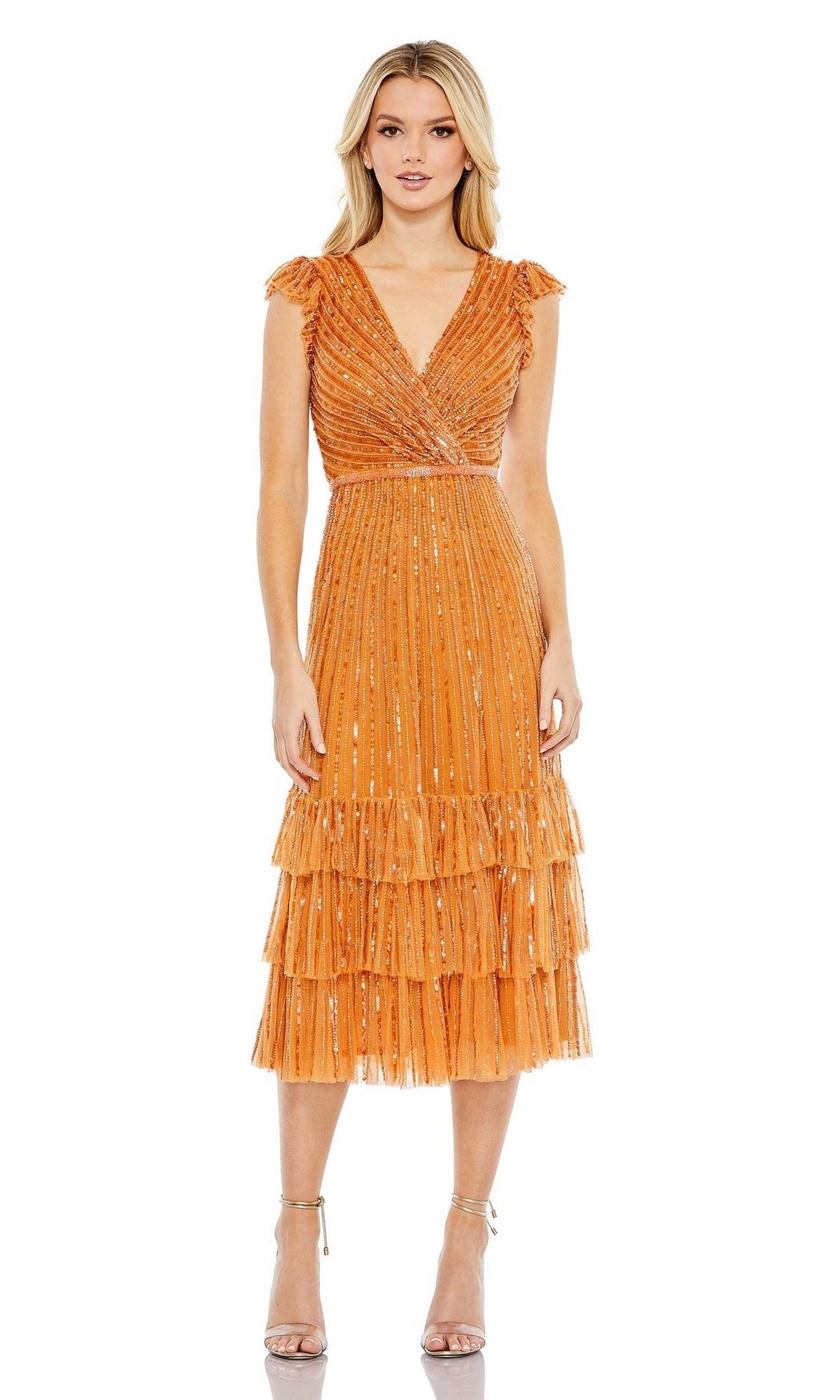Woman wearing the Mac Duggal 5585 Cap-Sleeve Midi Party Dress, featuring layered ruffles and metallic accents, standing in heels against a white background.